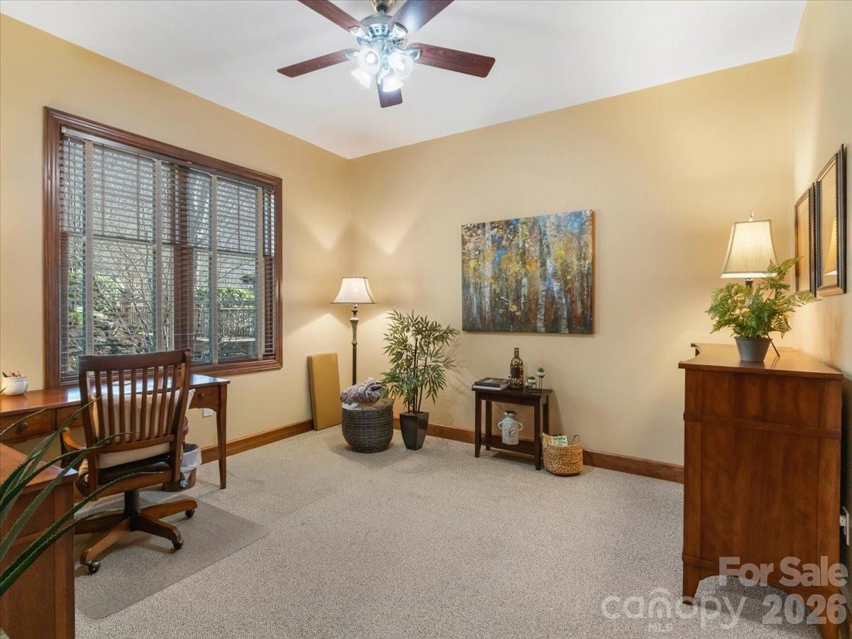 600 Andrew Banks Road, Unit D4 Burnsville, NC 28714 - Photo 22 of 42 a living room with furniture and wooden floor