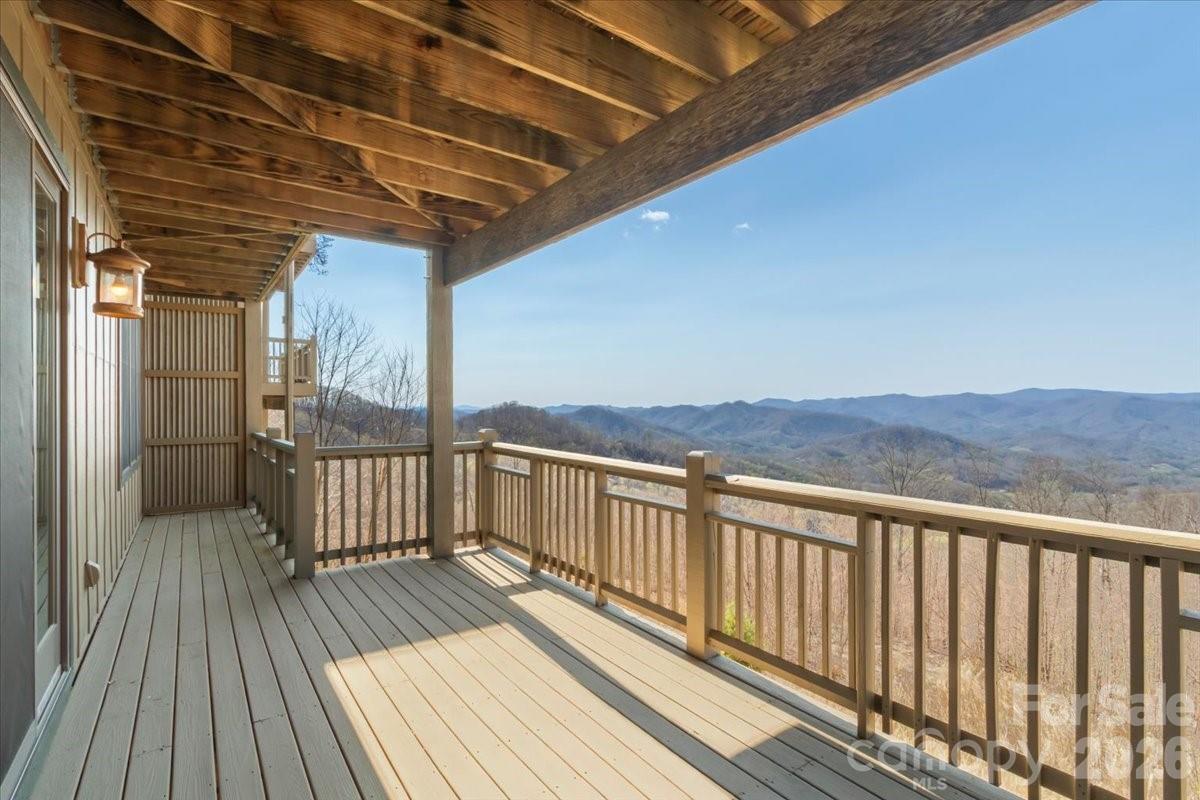 600 Andrew Banks Road, Unit D4 Burnsville, NC 28714 - Photo 8 of 42 a view of balcony with wooden floor