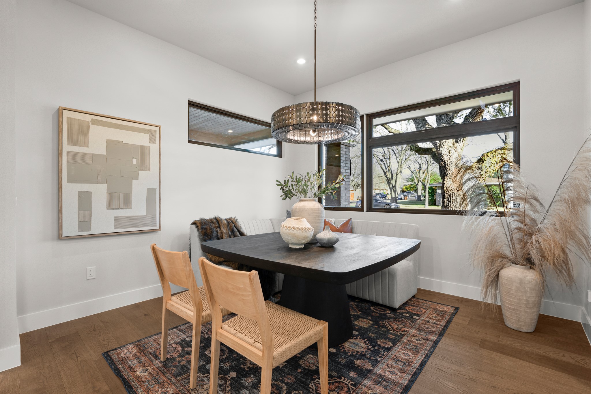 7706 Rutgers Avenue Austin, TX 78757 - Photo 24 of 35 Dining area with dark wood-style floors, recessed lighting, and a chandelier