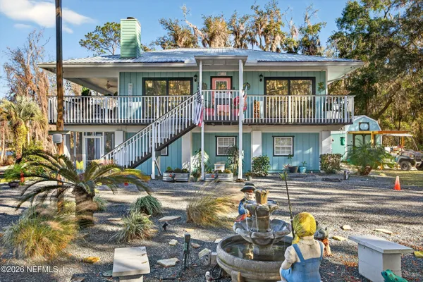 a front view of a house with swimming pool