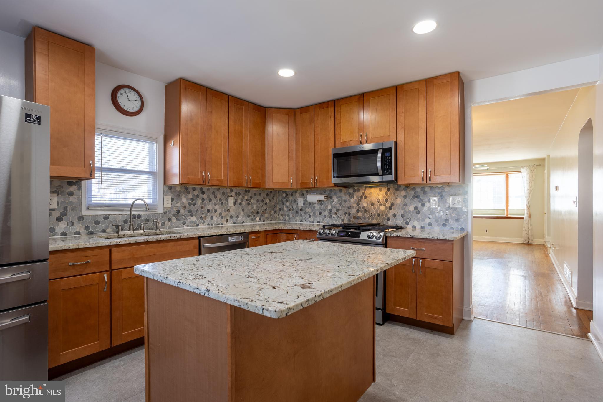 8300 Dalesford Road Baltimore, MD 21234 - Photo 15 of 32 Updated kitchen with granite and stainless applian
