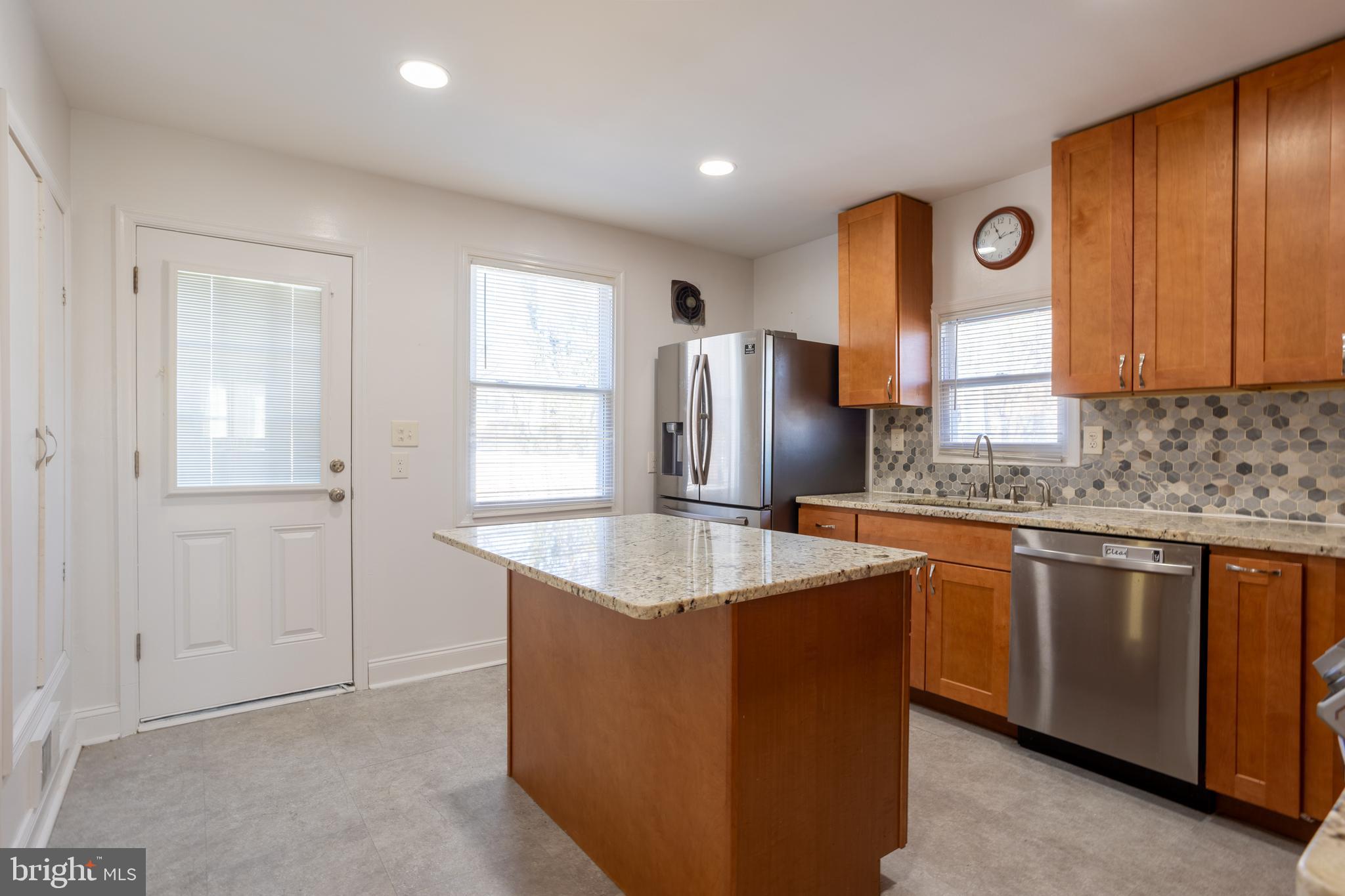 8300 Dalesford Road Baltimore, MD 21234 - Photo 16 of 32 Updated kitchen with back door to deck