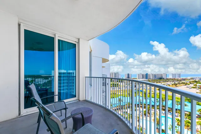 a view of balcony with furniture