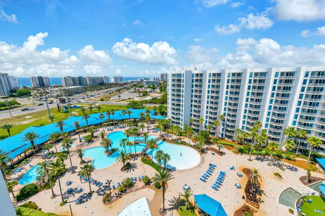 a view of swimming pool outdoor seating and yard