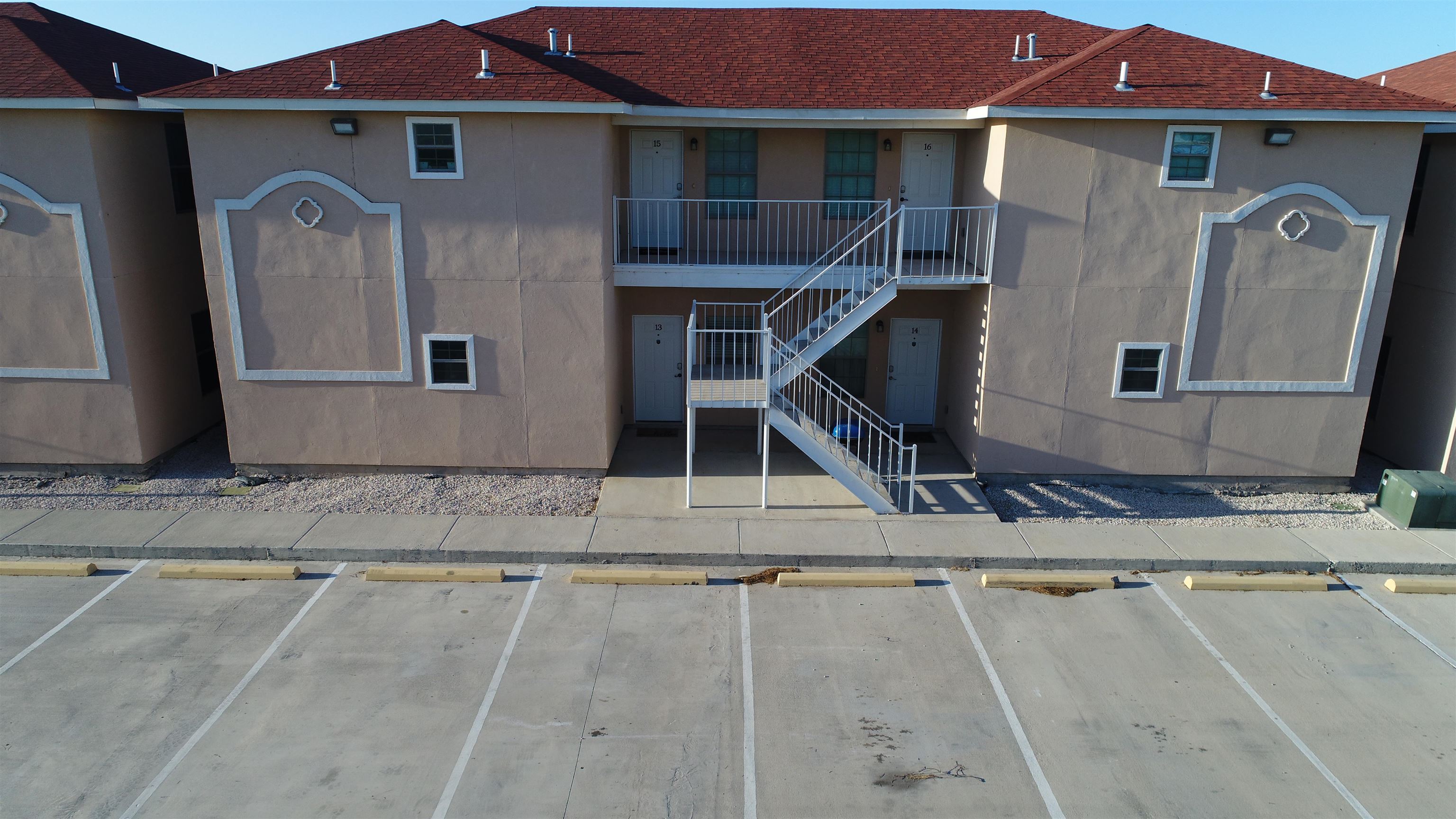 391 Riverside Drive, Unit 22 Eagle Pass, TX 78852 - Photo 1 of 1 a front view of a house with windows
