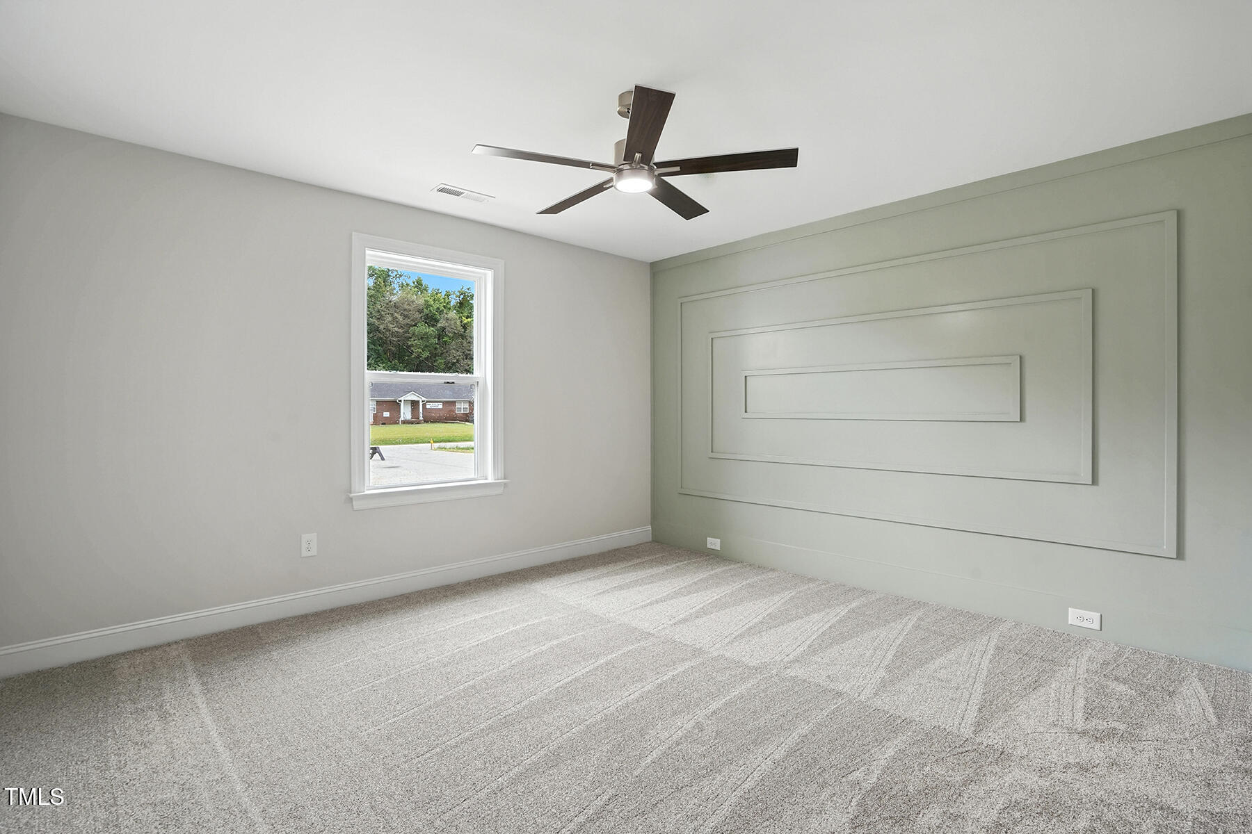 8686 Green Path Road Dunn, NC 28334 - Photo 14 of 31 a view of an empty room with a window