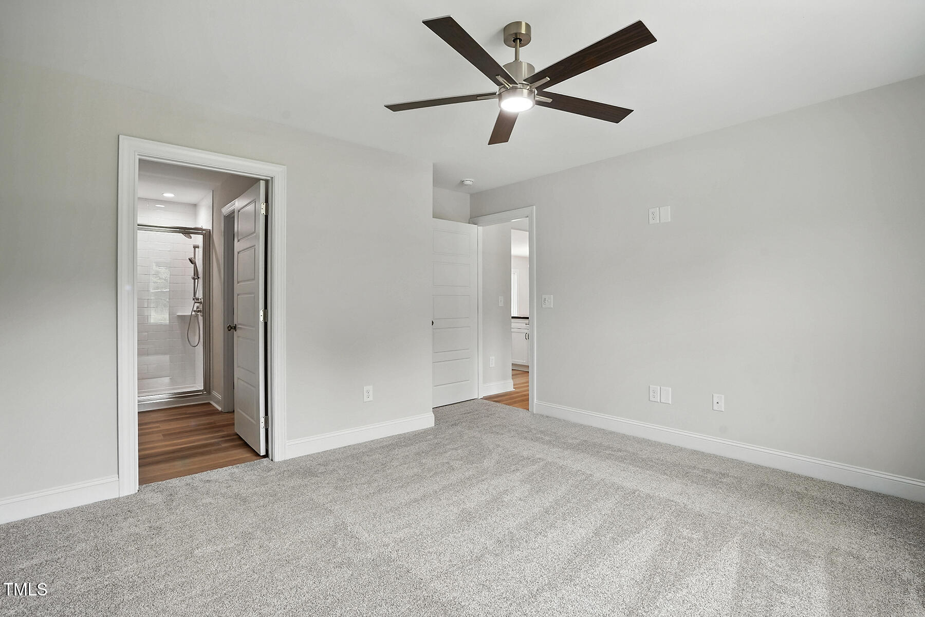 8686 Green Path Road Dunn, NC 28334 - Photo 15 of 31 an empty room and view of a bathroom