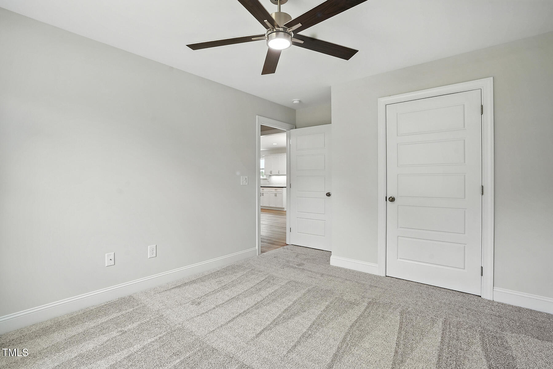 8686 Green Path Road Dunn, NC 28334 - Photo 22 of 31 a view of empty room with ceiling fan