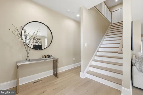 a large white bed in a white room