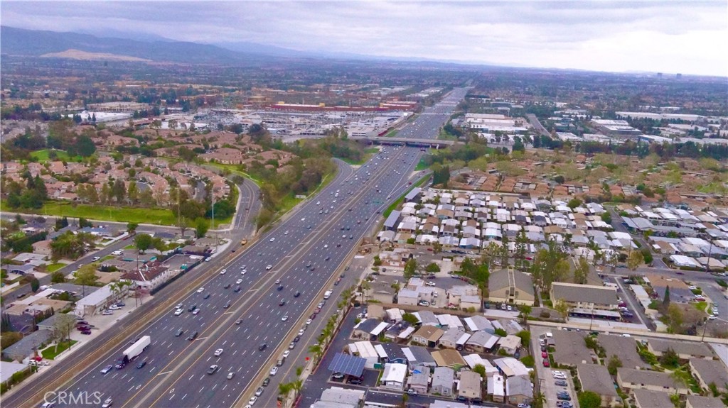 1782 Nisson Road, Unit 7 Tustin, CA 92780 - Photo 28 of 29 an aerial view of residential houses with city view