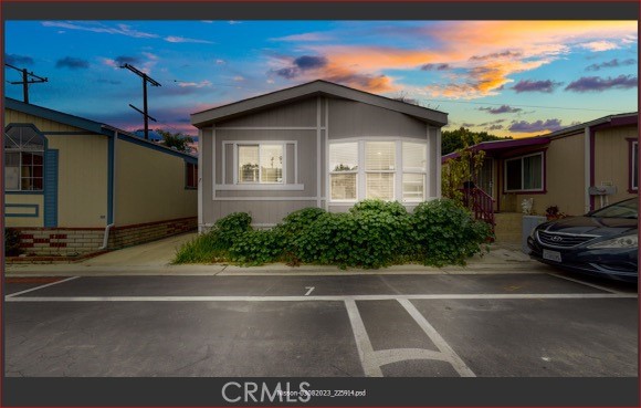 1782 Nisson Road, Unit 7 Tustin, CA 92780 - Photo 29 of 29 a front view of a house with yard