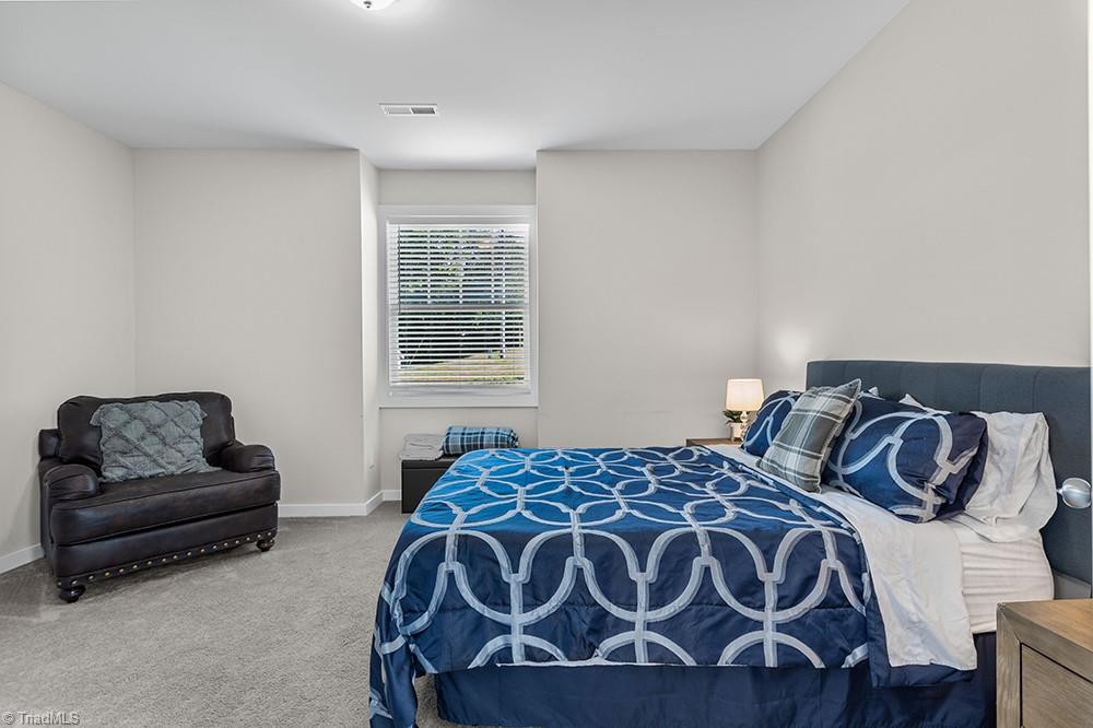 442 Weatherly Street Ramseur, NC 27316 - Photo 14 of 28 Primary bedroom