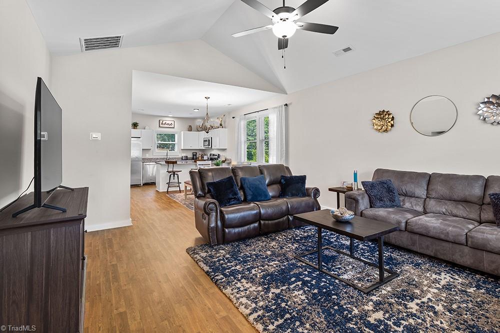 442 Weatherly Street Ramseur, NC 27316 - Photo 4 of 28 Open concept living, dining, and kitchen