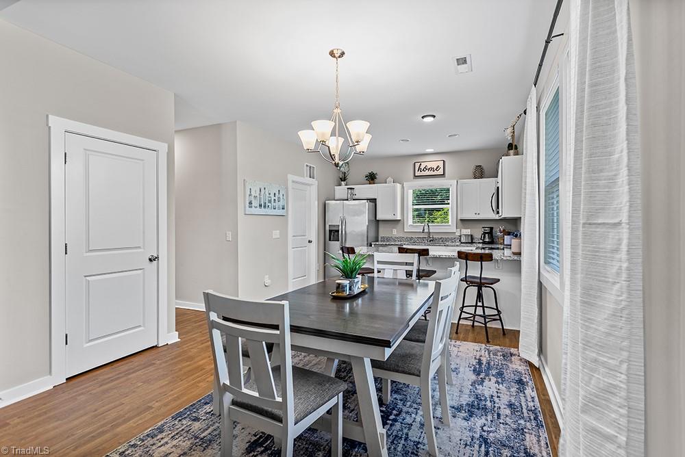442 Weatherly Street Ramseur, NC 27316 - Photo 7 of 28 dining room, large pantry, and kitchen