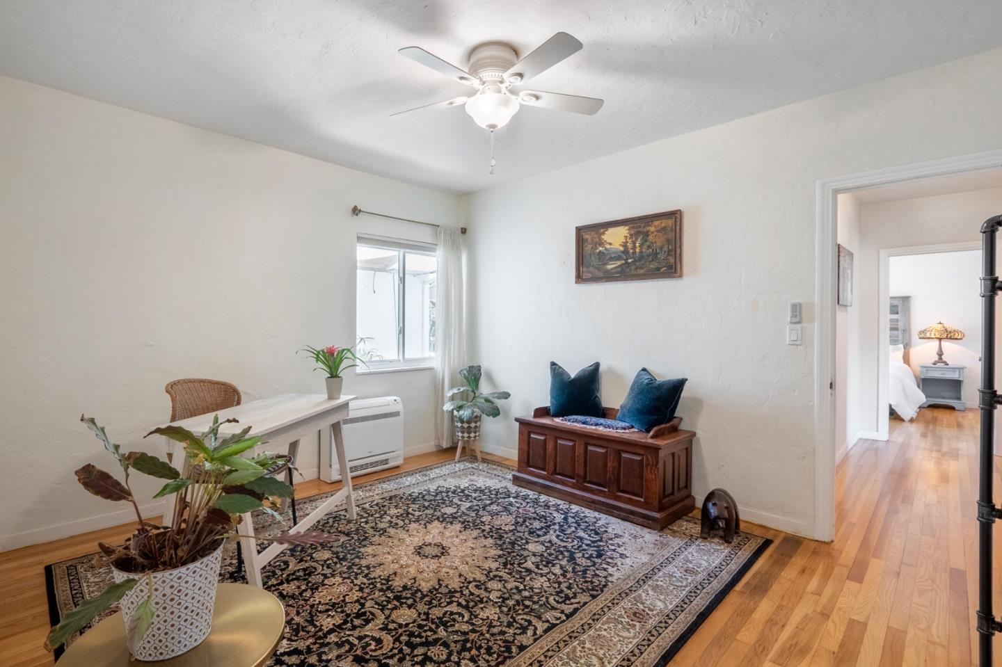 545 4th Street Gilroy, CA 95020 - Photo 13 of 36 a living room with furniture and a rug