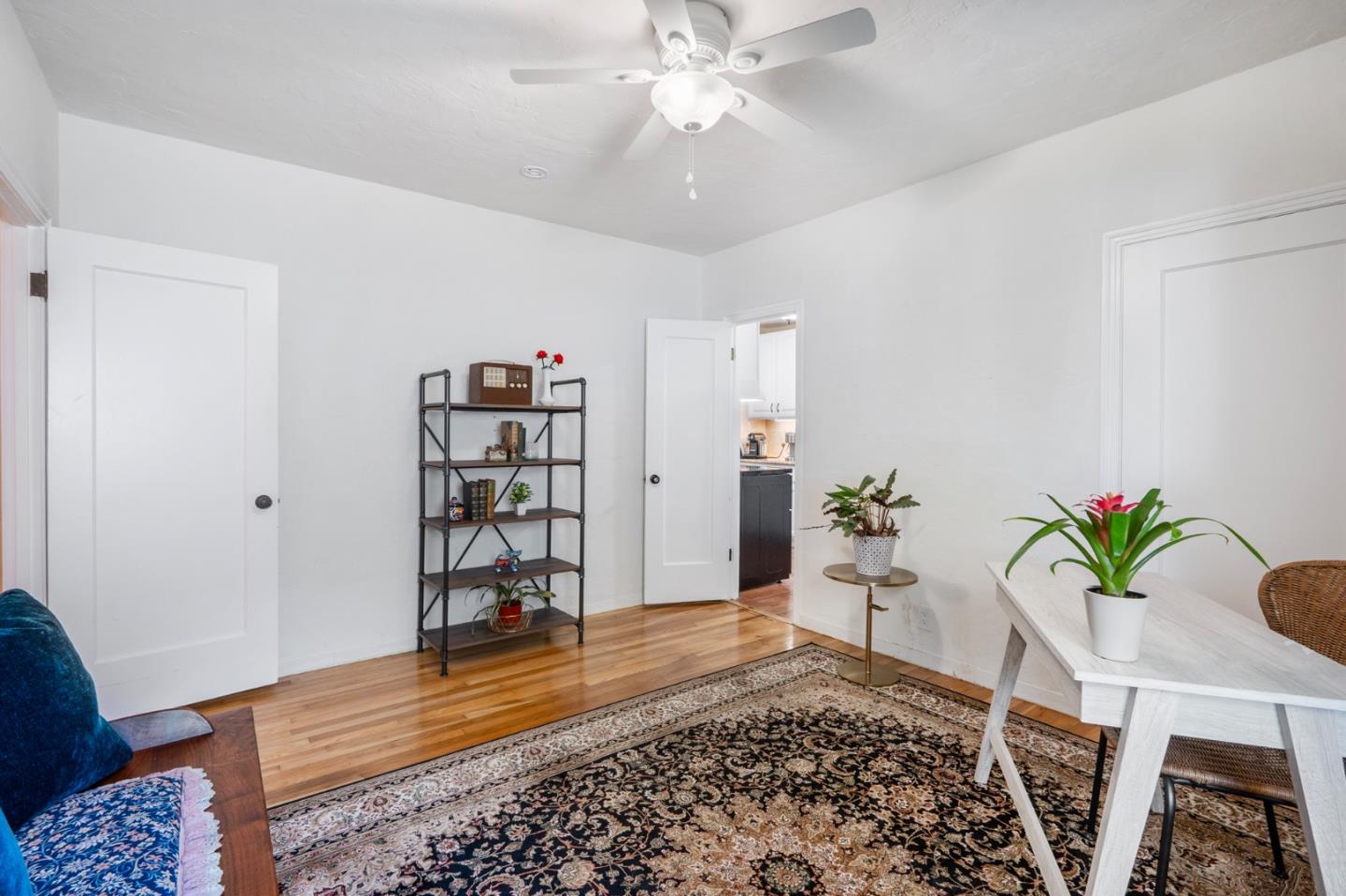 545 4th Street Gilroy, CA 95020 - Photo 14 of 36 a living room with furniture and a rug