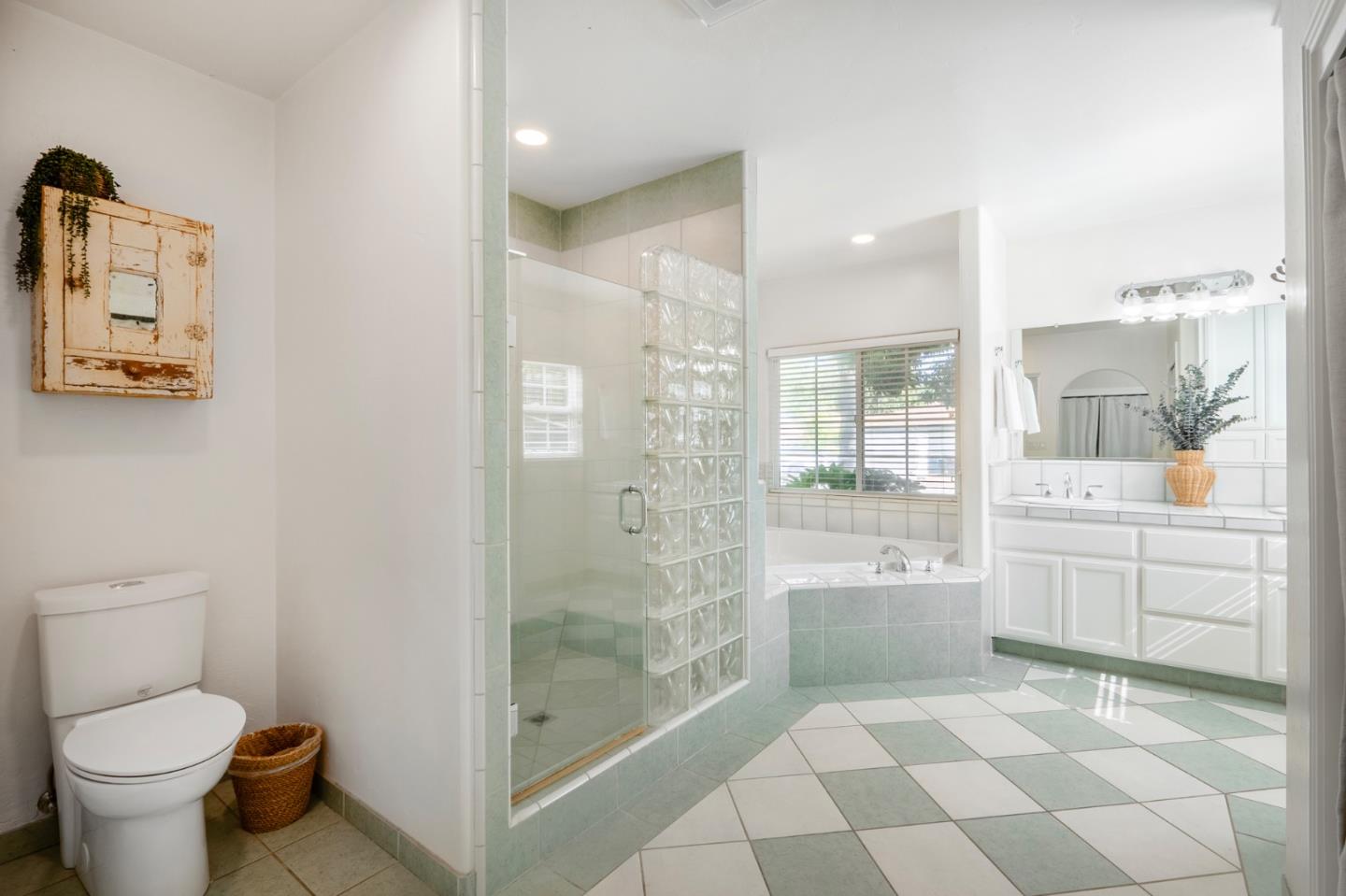 545 4th Street Gilroy, CA 95020 - Photo 22 of 36 a bathroom with a sink toilet and shower