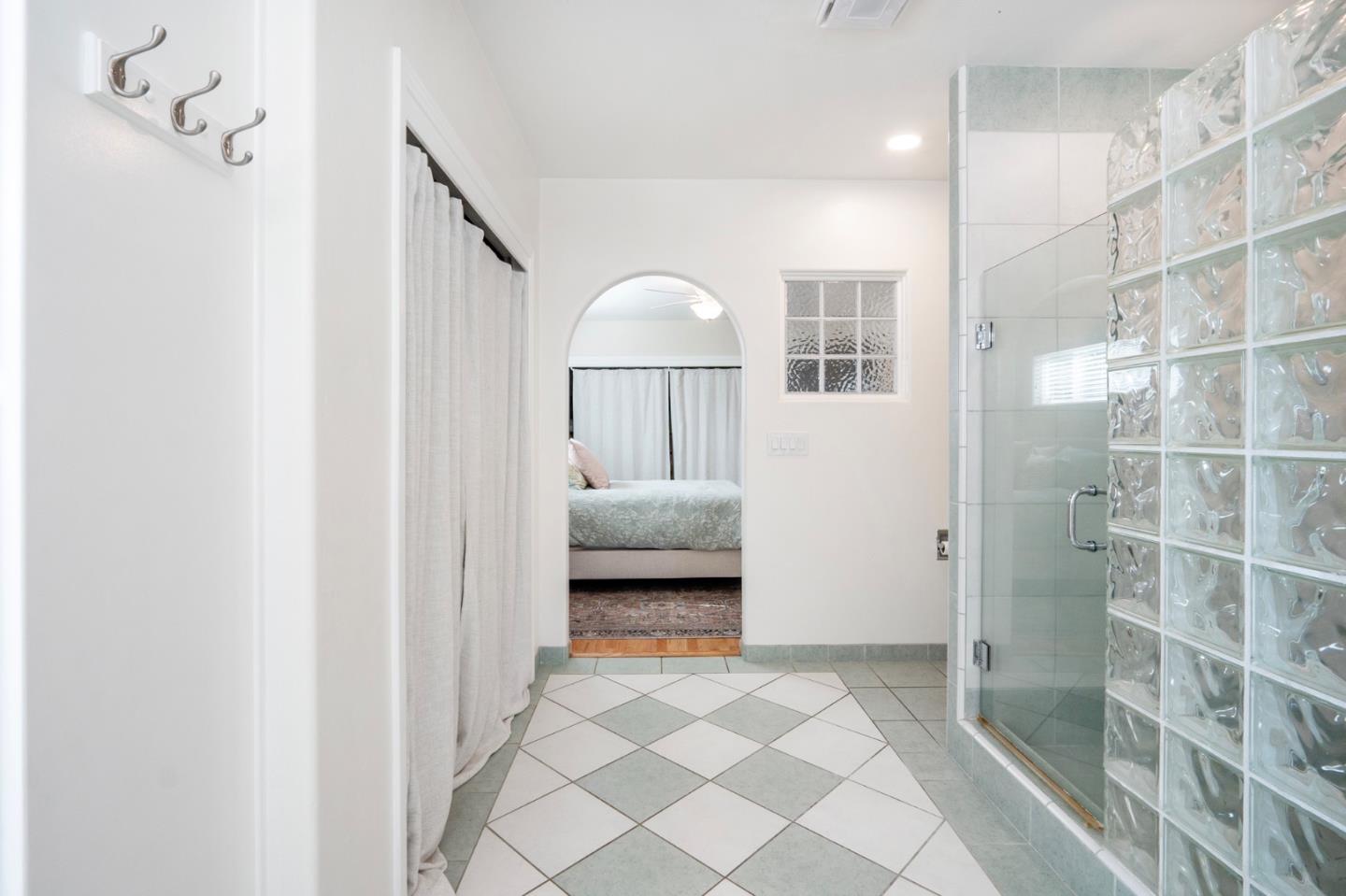545 4th Street Gilroy, CA 95020 - Photo 24 of 36 a bathroom with a sink and a mirror