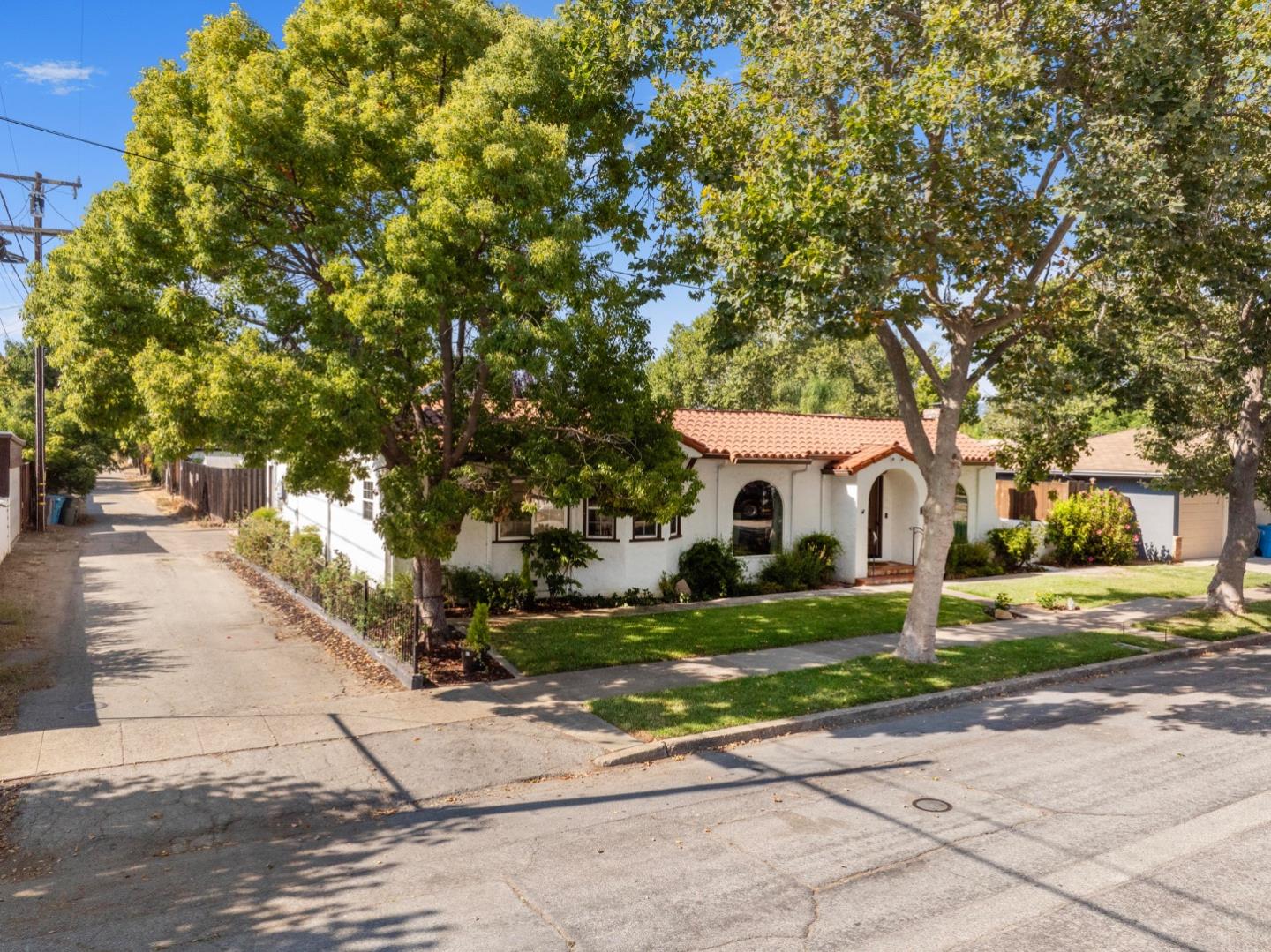545 4th Street Gilroy, CA 95020 - Photo 3 of 36 a front view of a house with a yard and garage