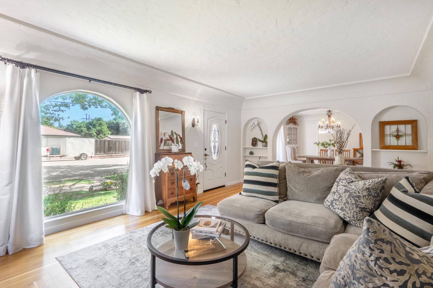 545 4th Street Gilroy, CA 95020 - Photo 5 of 36 a living room with furniture potted plant and a large window