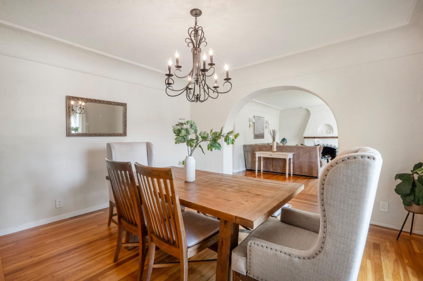 545 4th Street Gilroy, CA 95020 - Photo 8 of 36 a view of a dining room with furniture wooden floor and chandelier