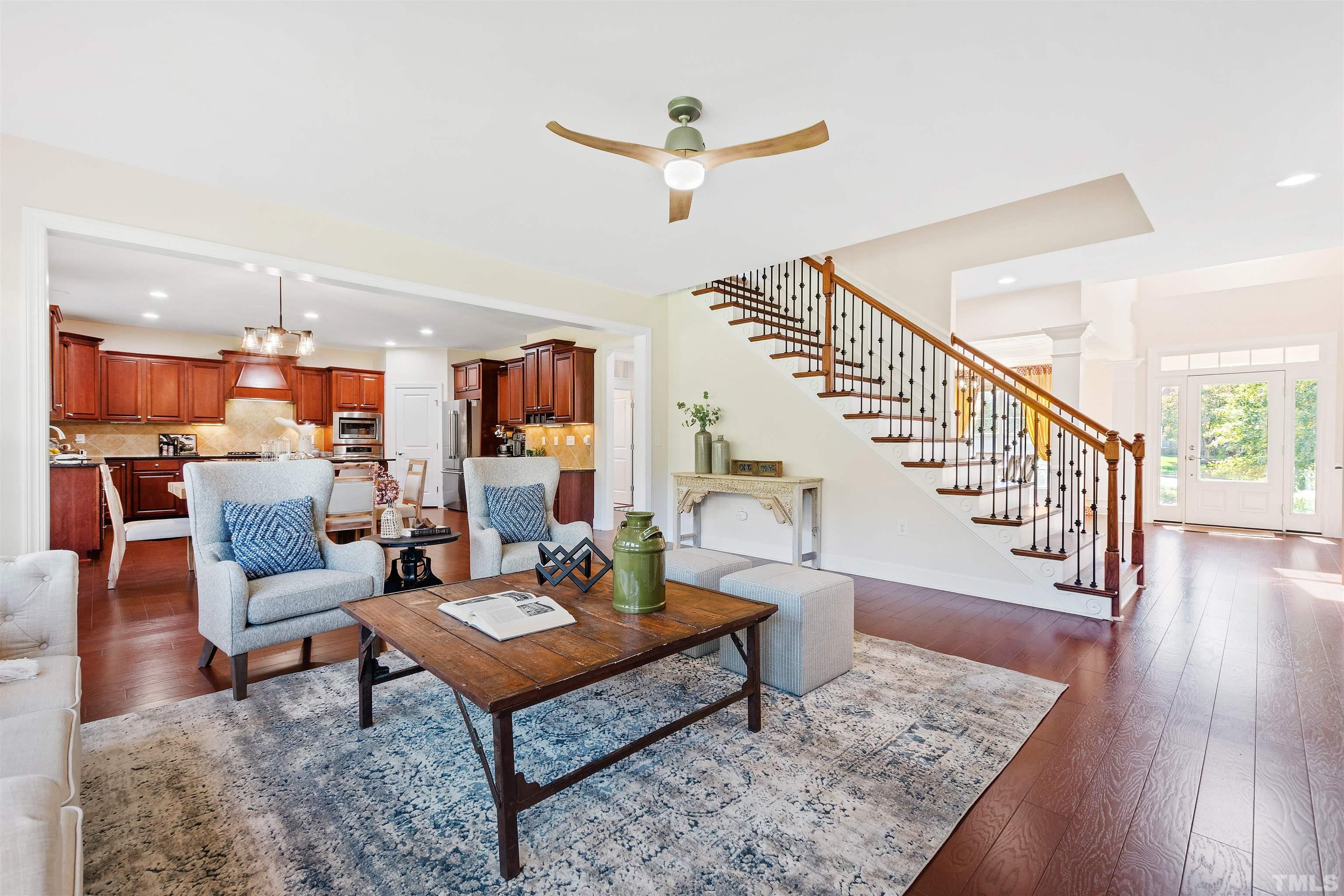 400 Alliance Circle Cary, NC 27519 - Photo 12 of 62 a living room with furniture and wooden floor