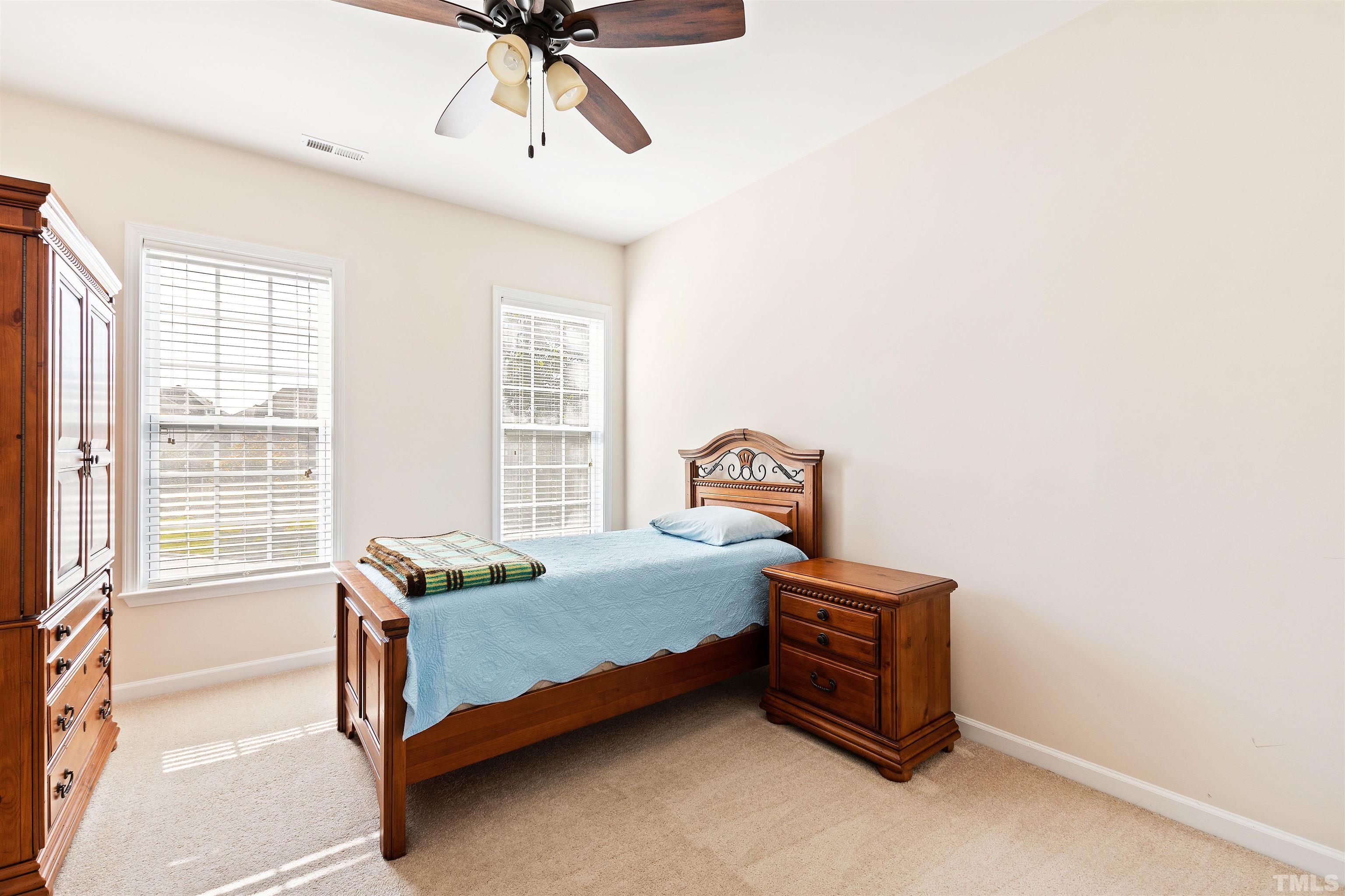 400 Alliance Circle Cary, NC 27519 - Photo 37 of 62 a bedroom with a bed and a window