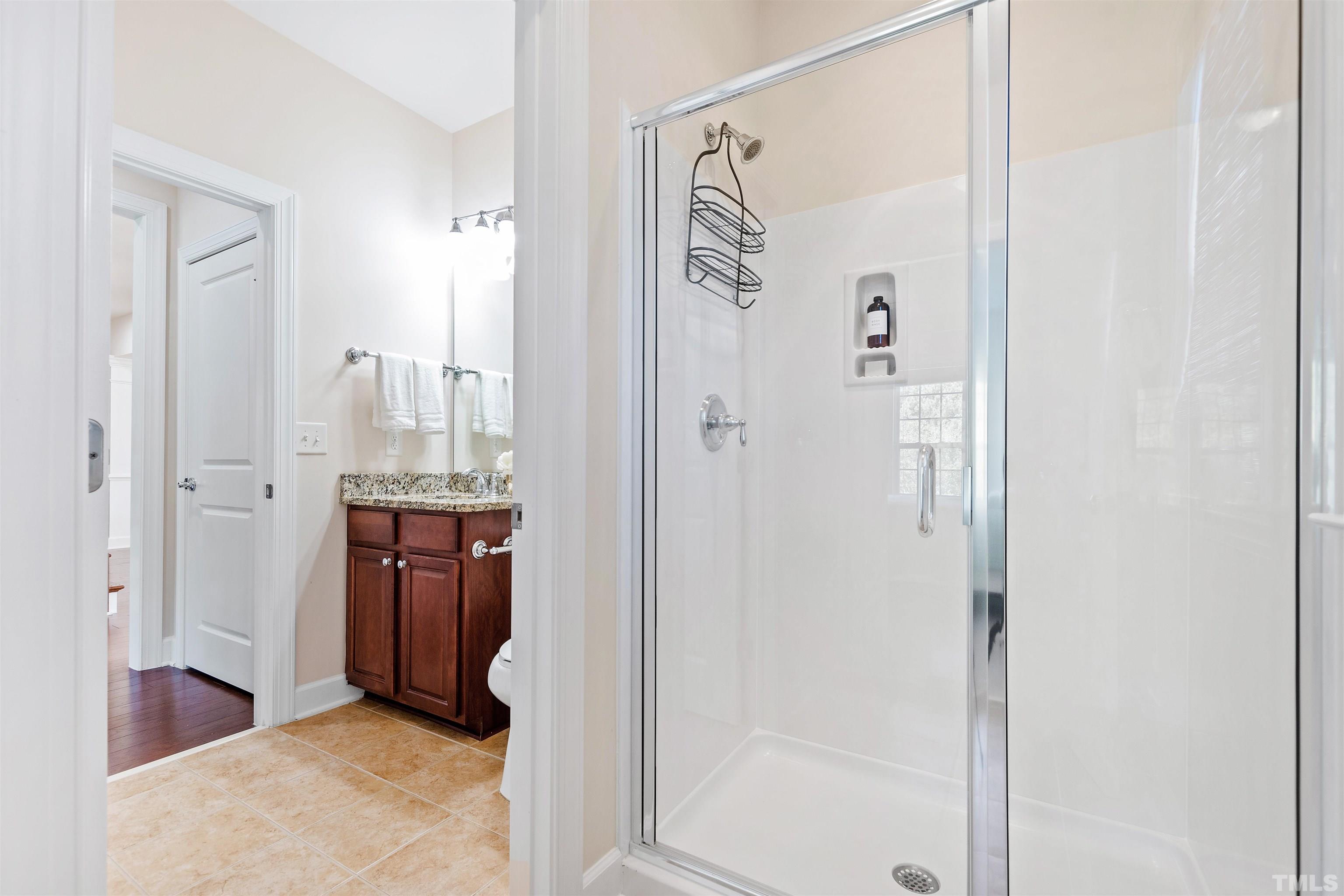 400 Alliance Circle Cary, NC 27519 - Photo 38 of 62 a bathroom with a shower and a sink
