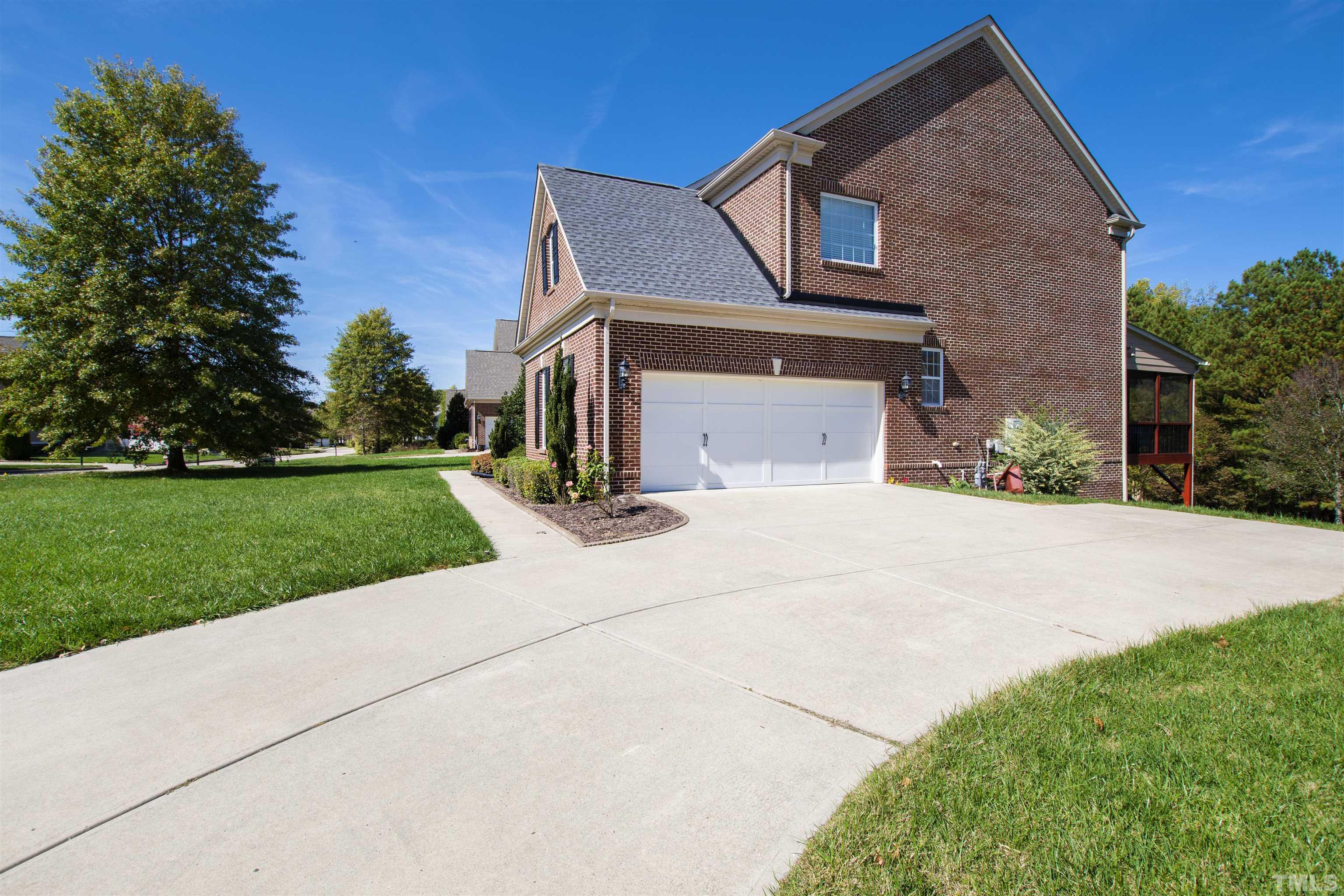 400 Alliance Circle Cary, NC 27519 - Photo 59 of 62 a front view of a house with a yard