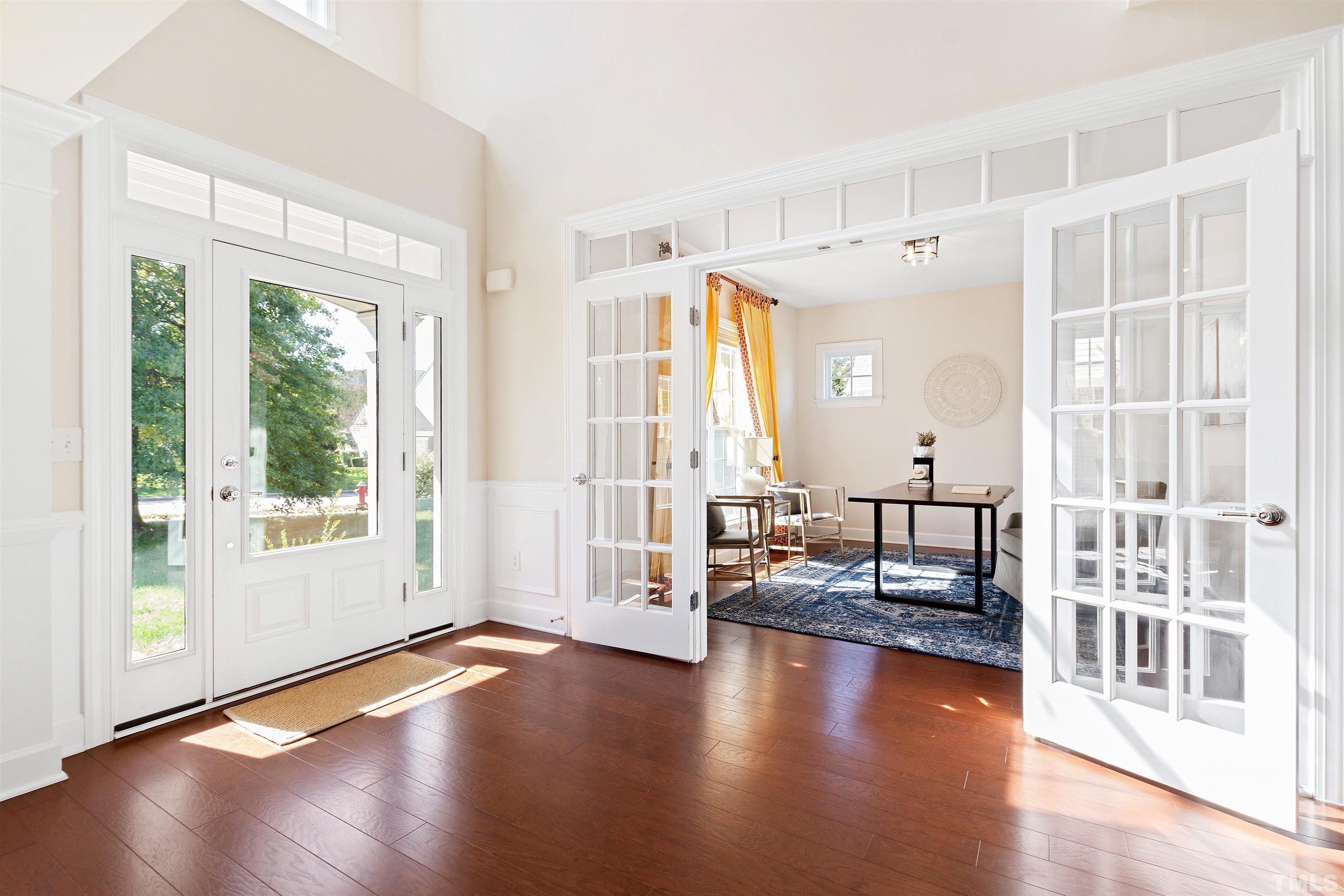 400 Alliance Circle Cary, NC 27519 - Photo 8 of 62 a view of a living room with a large window and wooden floor