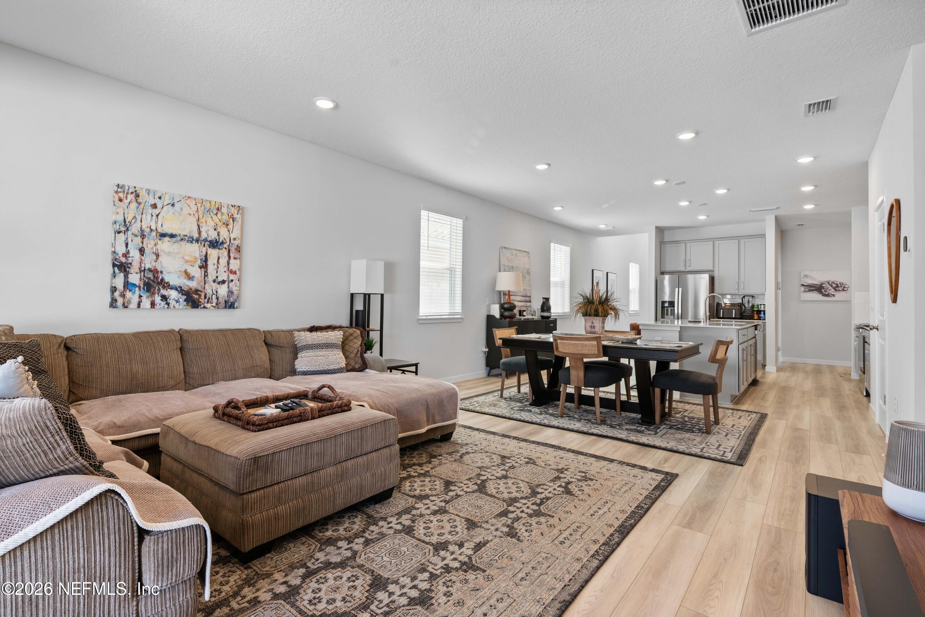 96245 Broadmoore Road Fernandina Beach, FL 32034 - Photo 12 of 33 a living room with furniture and wooden floor