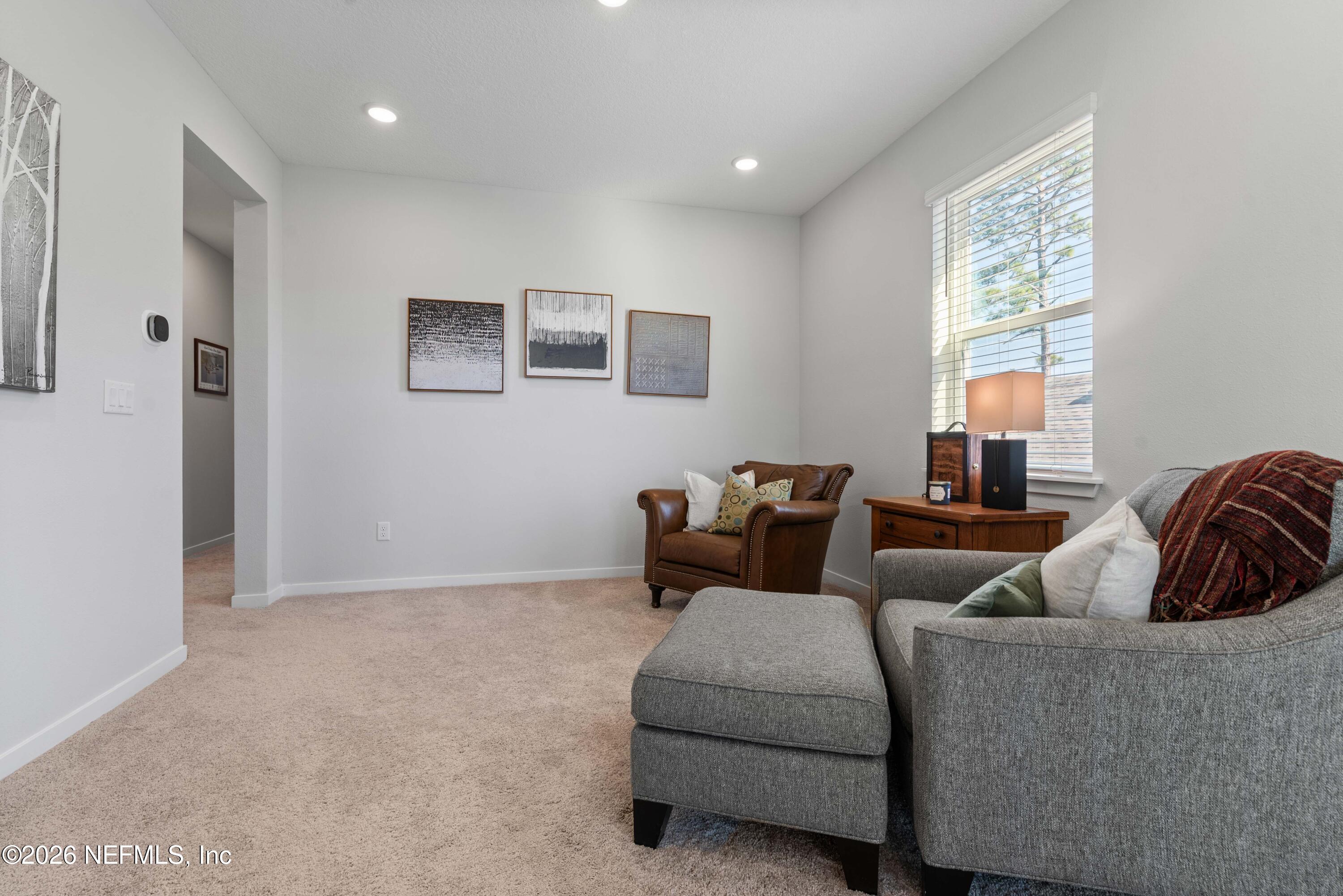96245 Broadmoore Road Fernandina Beach, FL 32034 - Photo 21 of 33 a living room with furniture and a window
