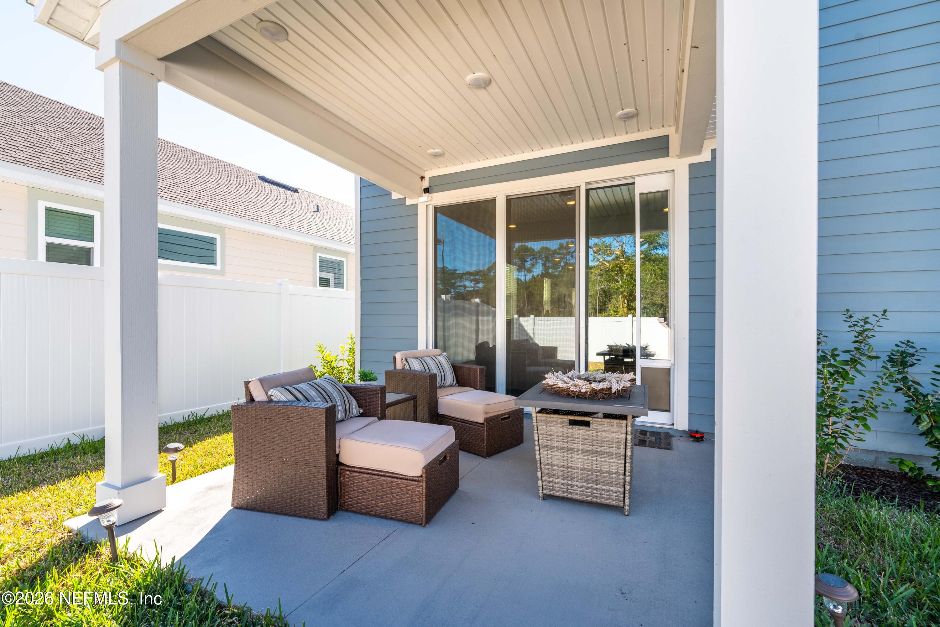 96245 Broadmoore Road Fernandina Beach, FL 32034 - Photo 29 of 33 a building outdoor space with patio furniture