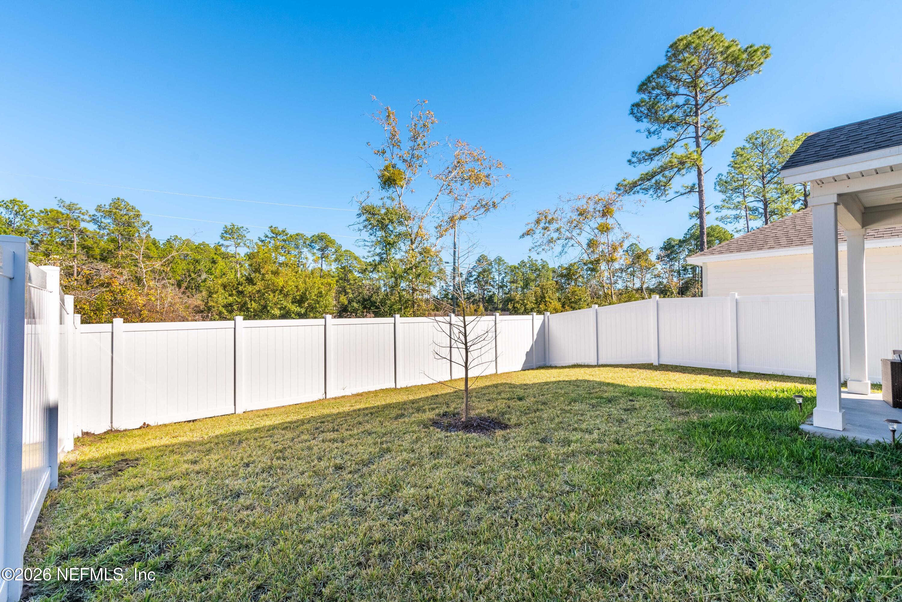 96245 Broadmoore Road Fernandina Beach, FL 32034 - Photo 32 of 33 a house view with a backyard space
