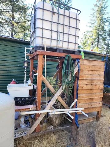 a view of outdoor space and wooden deck
