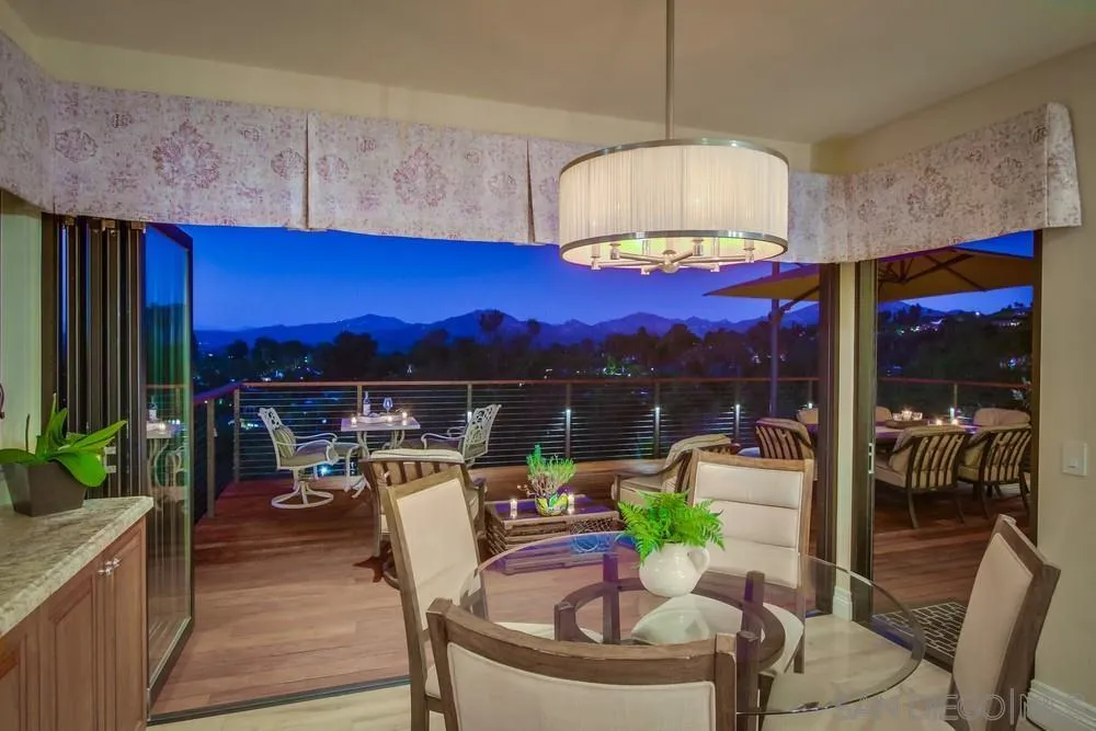 16062 Stoney Acres Road Poway, CA 92064 - Photo 14 of 75 a view of a dining room with furniture window and outside view