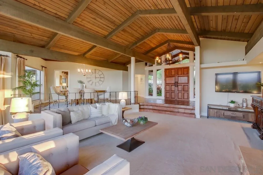 16062 Stoney Acres Road Poway, CA 92064 - Photo 27 of 75 a living room with furniture and a flat screen tv