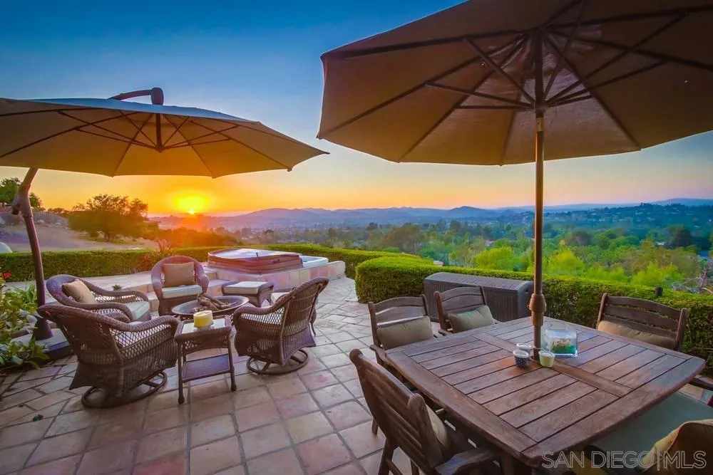 16062 Stoney Acres Road Poway, CA 92064 - Photo 3 of 75 a view of an outdoor sitting area with furniture and umbrella