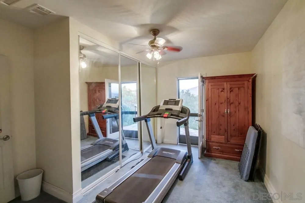16062 Stoney Acres Road Poway, CA 92064 - Photo 55 of 75 a view of a room with gym equipment