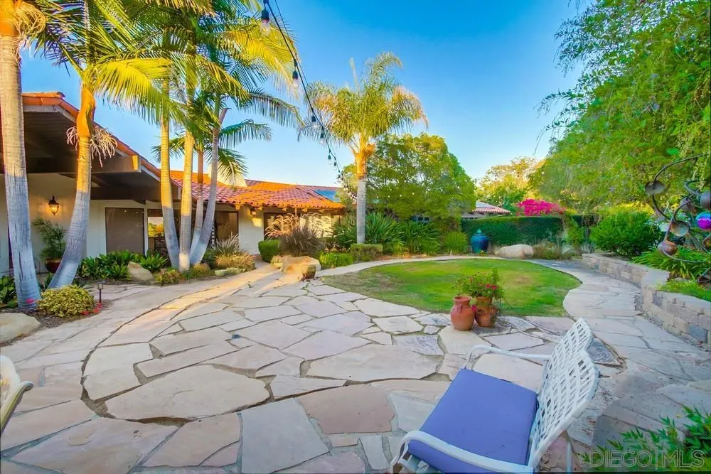 16062 Stoney Acres Road Poway, CA 92064 - Photo 59 of 75 a view of backyard with swimming pool and outdoor seating