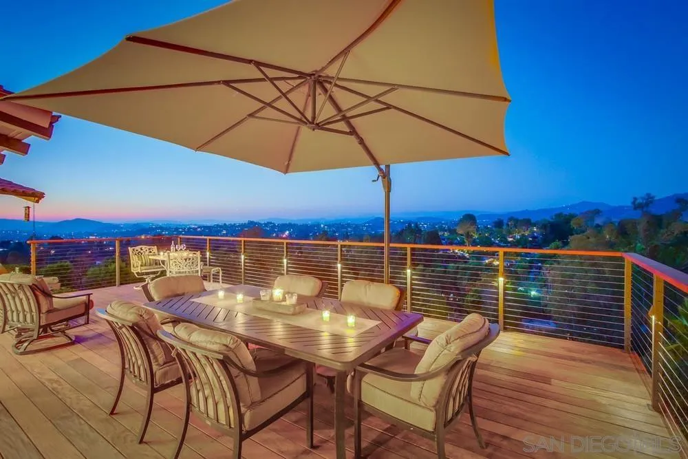 16062 Stoney Acres Road Poway, CA 92064 - Photo 10 of 75 a view of a terrace with furniture and umbrella