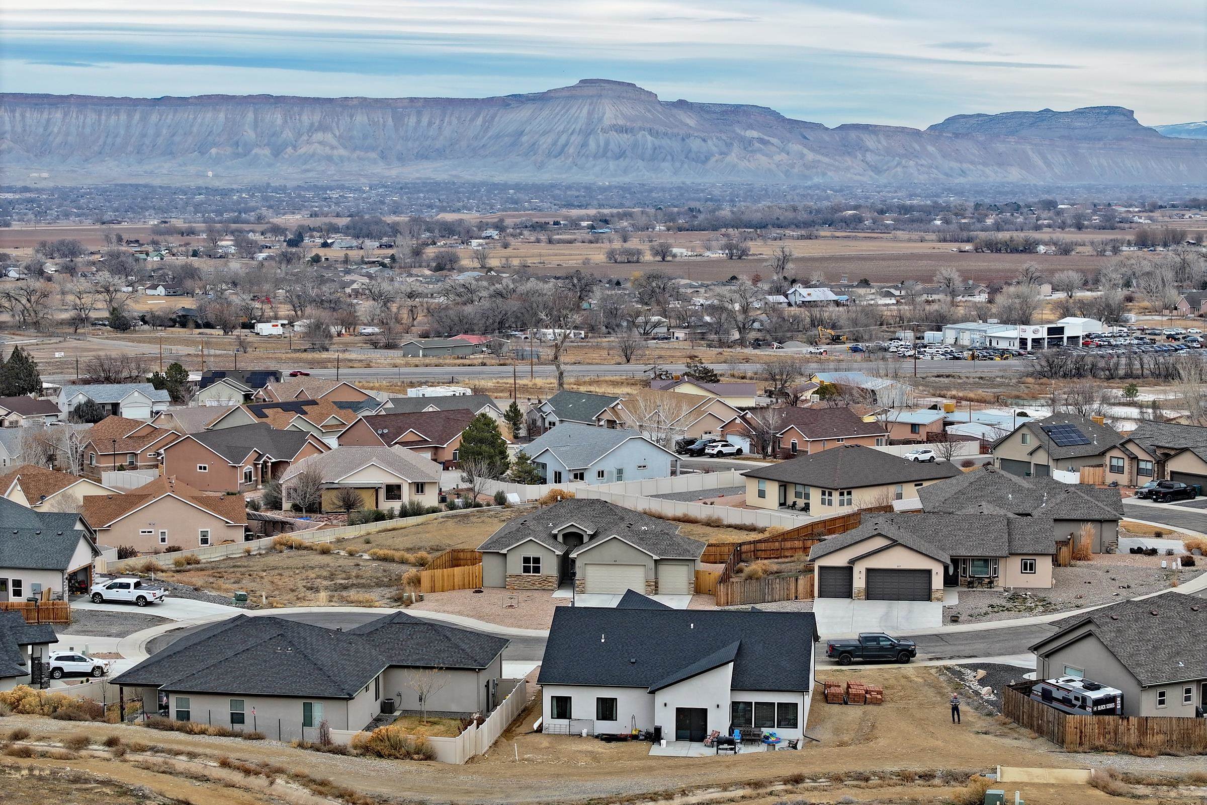 104 Dry Creek Road Grand Junction, CO 81503 - Photo 11 of 13 an aerial view of residential houses and outdoor space