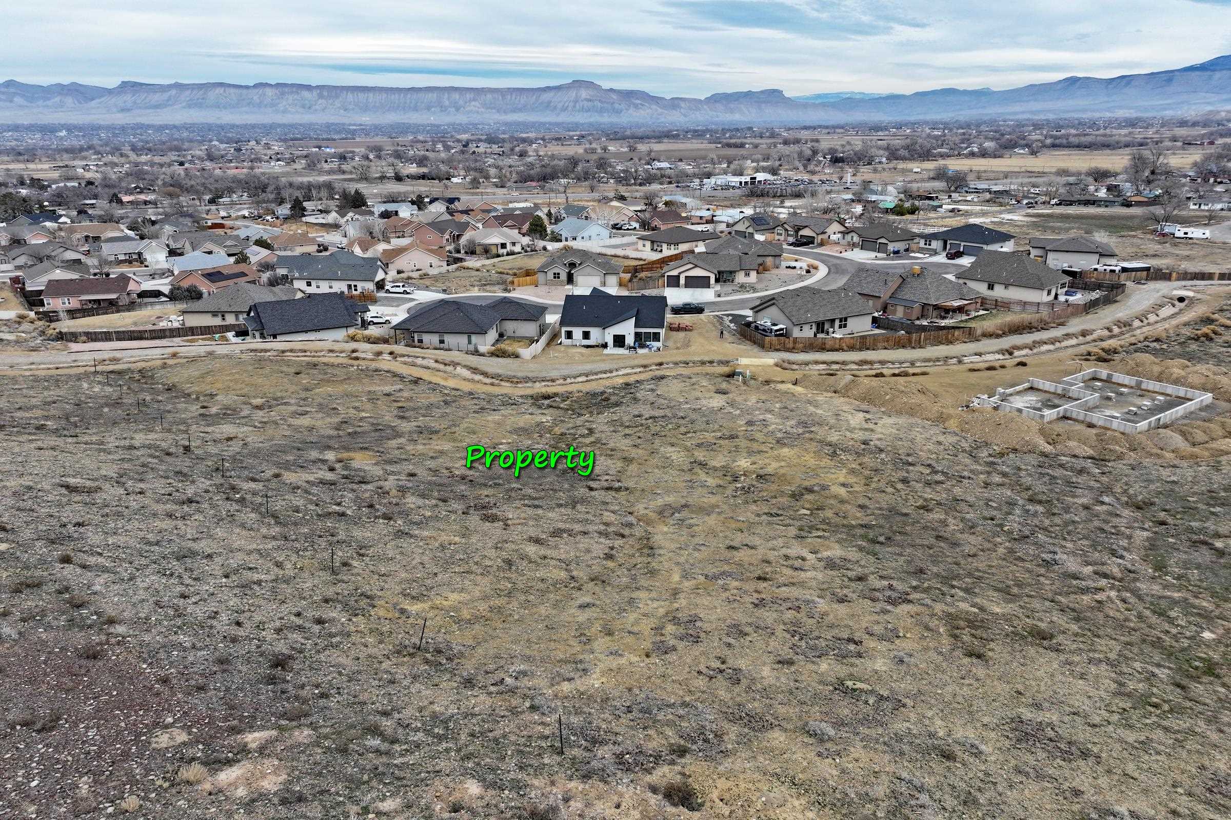 104 Dry Creek Road Grand Junction, CO 81503 - Photo 2 of 13 an aerial view of multiple house