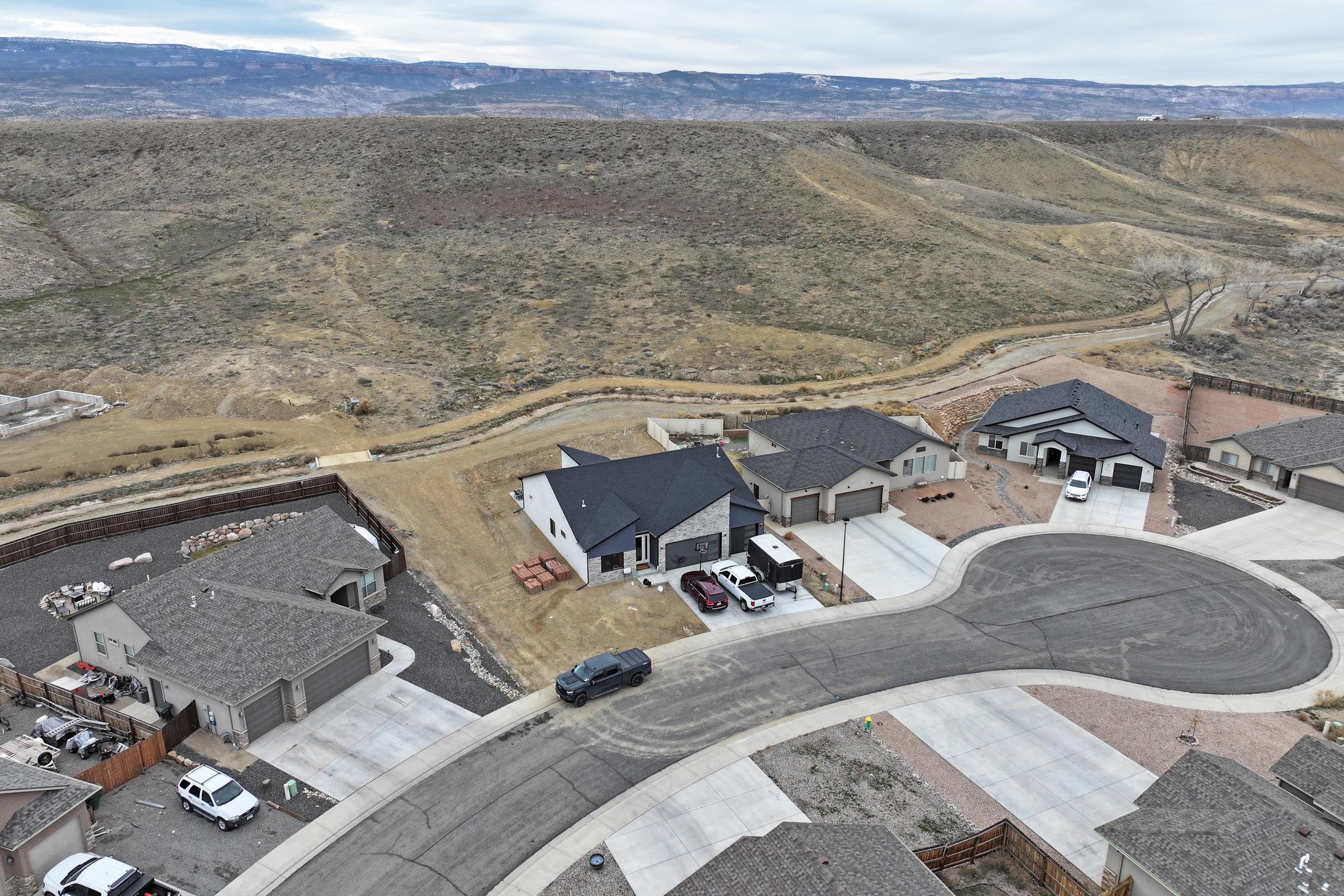 104 Dry Creek Road Grand Junction, CO 81503 - Photo 6 of 13 an aerial view of a house with outdoor space