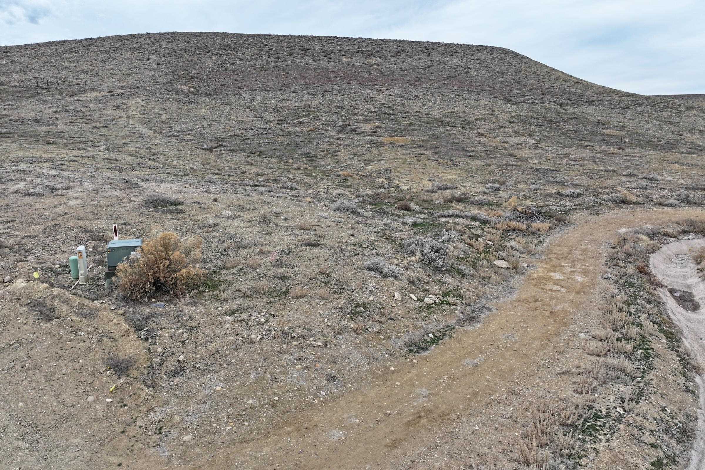 104 Dry Creek Road Grand Junction, CO 81503 - Photo 7 of 13 a view of a dry field