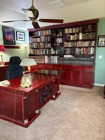 a room with furniture and soccer table