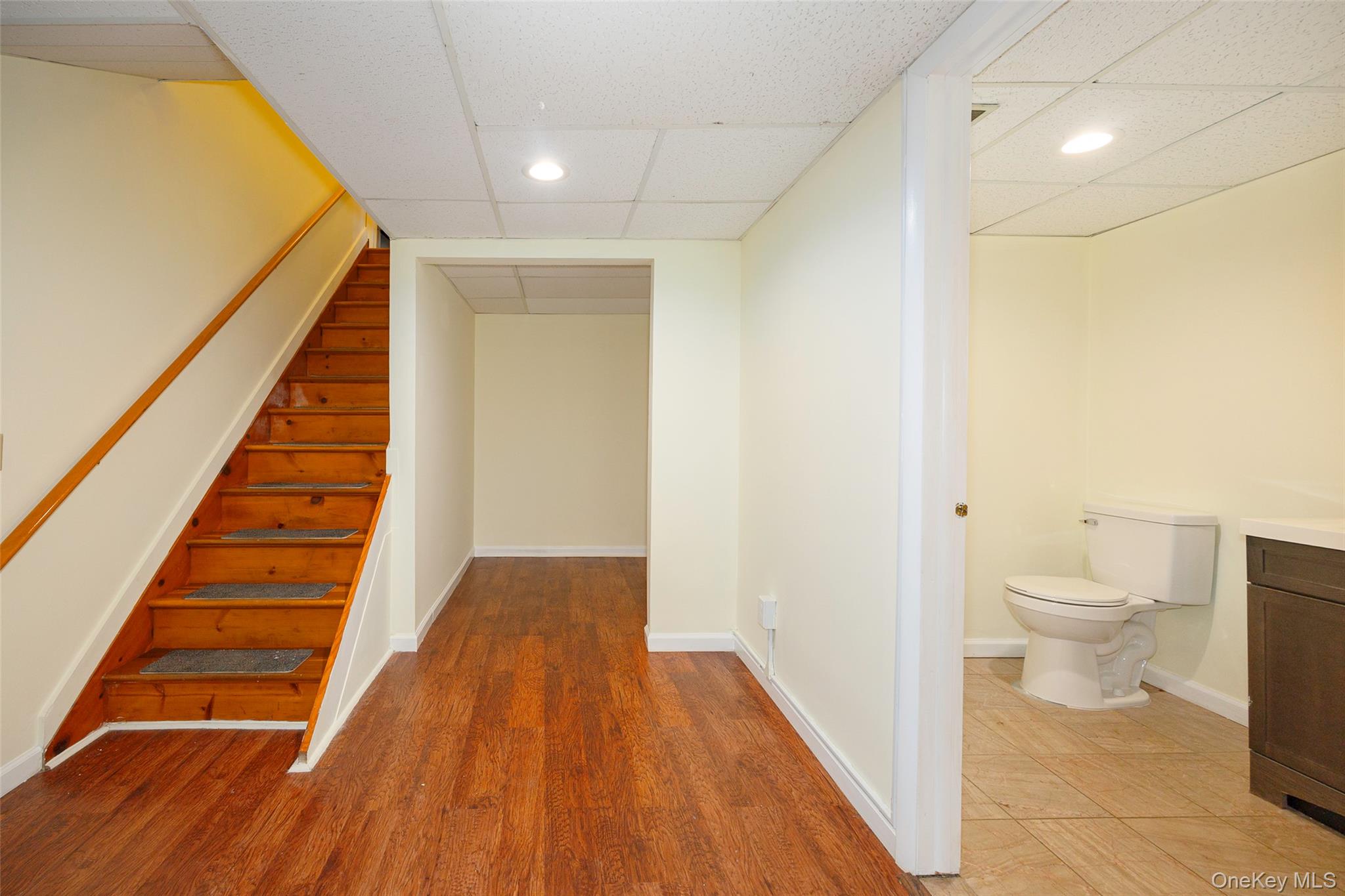 303 Freedom Road Pleasant Valley, NY 12569 - Photo 25 of 40 a bathroom with a toilet and a wooden floor