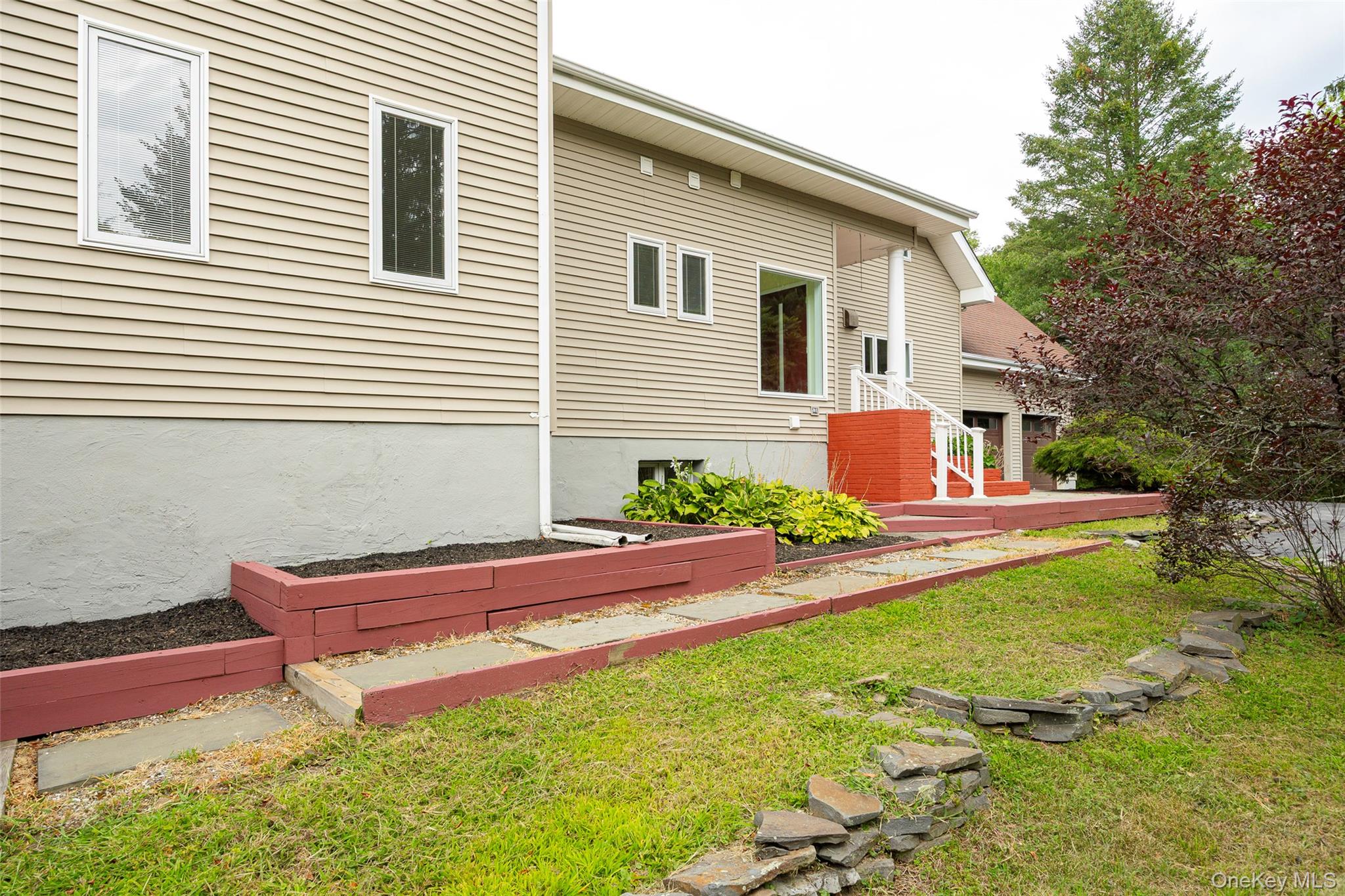 303 Freedom Road Pleasant Valley, NY 12569 - Photo 37 of 40 a front view of house with yard and outdoor seating