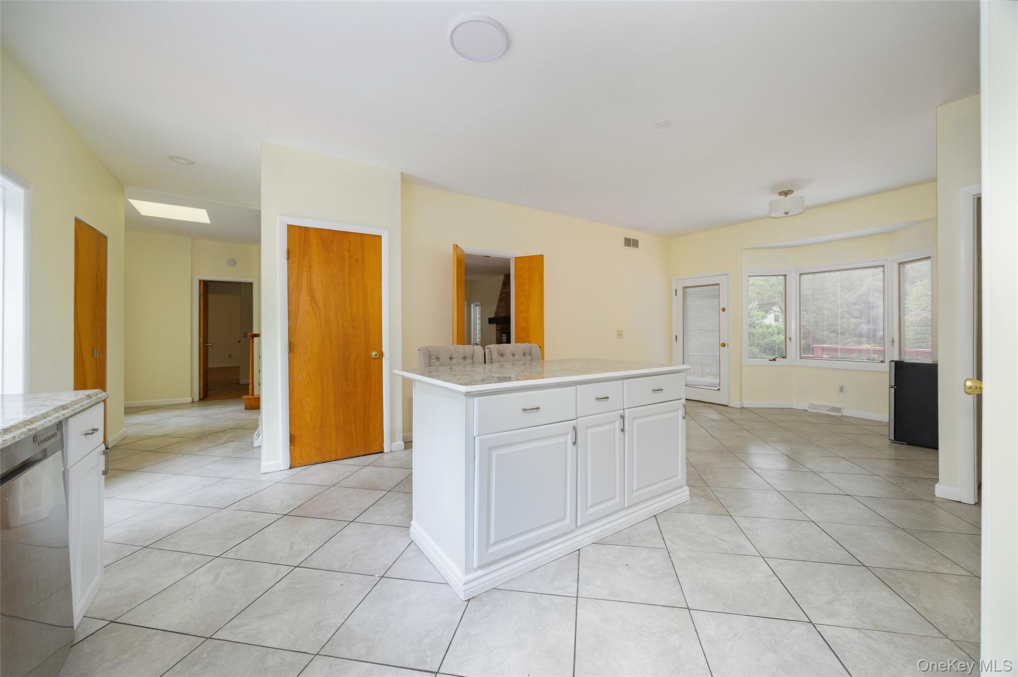 303 Freedom Road Pleasant Valley, NY 12569 - Photo 4 of 40 a spacious bathroom with a granite countertop sink mirror and a
