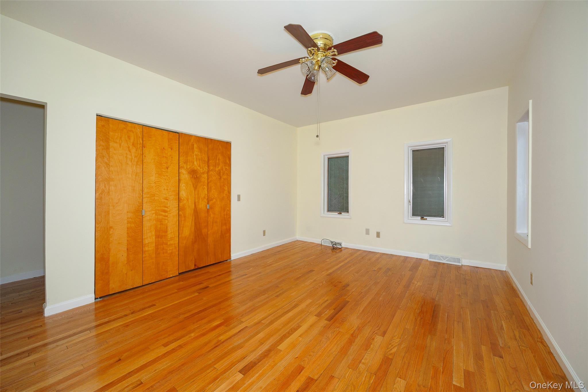 303 Freedom Road Pleasant Valley, NY 12569 - Photo 9 of 40 a view of an empty room with wooden floor